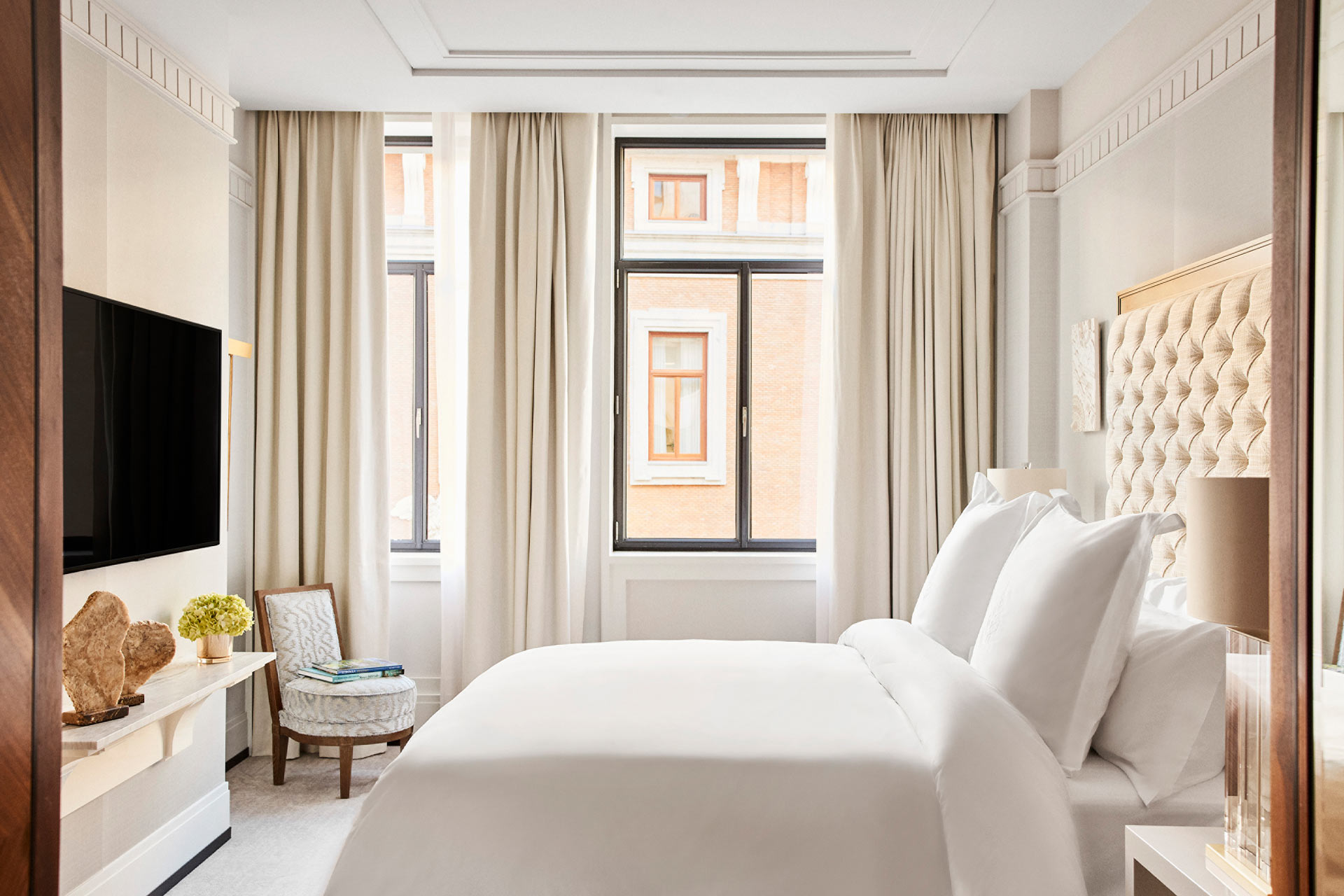 A guestroom at at Four Seasons Hotel Madrid in Spain