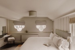 A newly renovated bedroom in the Coach House at GuestHouse Bath